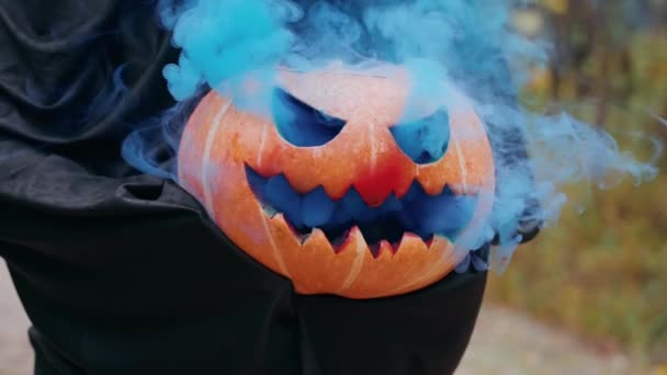Scary Unknown Person Black Holds Smoking Pumpkin Deep Forest Jack — Stock Video