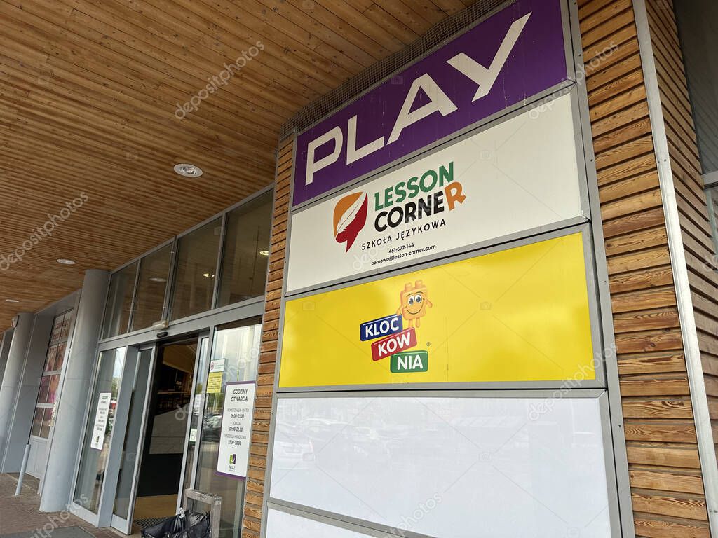 Warsaw, Poland - May 22, 2025: Play storefront displays Lesson Corner language school and KlocKowNia play area, creating a welcoming atmosphere for families and children