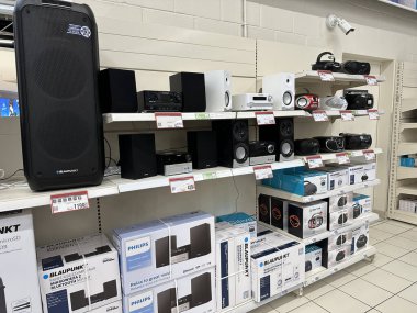 Warsaw, Poland - May 22, 2025: Display of audio devices including speakers and sound systems in electronics store, highlighting sound quality and design