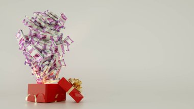 Açılan kırmızı hediye kutusundan çıkan 3 boyutlu Hint rupi desteleri.