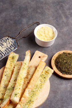 Peynirli parmesan peynirli Fransız ekmeği maydanoz kremalı İtalyan yemeği fotoğrafçılık arka plan sanat