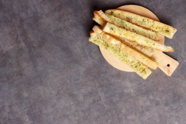 Peynirli parmesan peynirli Fransız ekmeği maydanoz kremalı İtalyan yemeği fotoğrafçılık arka plan sanat