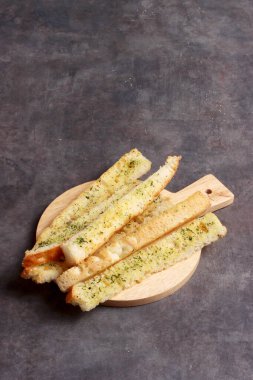 Peynirli parmesan peynirli Fransız ekmeği maydanoz kremalı İtalyan yemeği fotoğrafçılık arka plan sanat