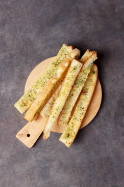 Peynirli parmesan peynirli Fransız ekmeği maydanoz kremalı İtalyan yemeği fotoğrafçılık arka plan sanat