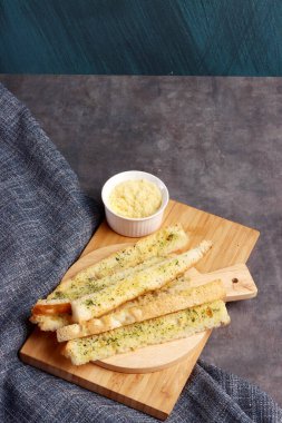 Peynirli parmesan peynirli Fransız ekmeği maydanoz kremalı İtalyan yemeği fotoğrafçılık arka plan sanat