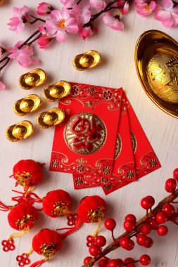 Çin 'in yeni yıl süs eşyası fotoğraf çiçeği altın çiçeği geleneksel fotoğraf Asyalı arka plan kırmızı