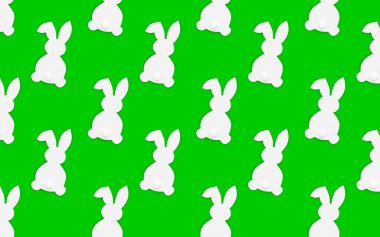 silhouette of a white rabbit on a green background lined up according to a template, Easter theme. High quality photo