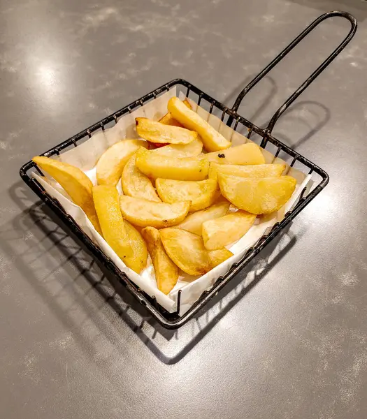 stock image French Fries in a Container Lined with Oil-Absorbing Tissue