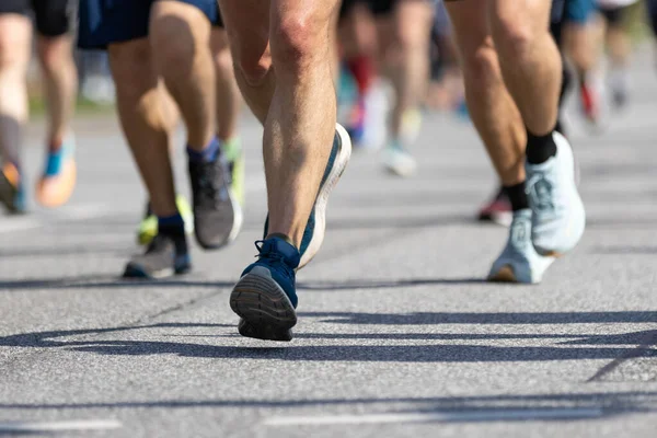 stock image group of marathon runners on the road