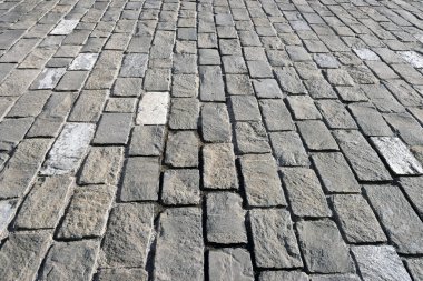 Gri kaldırım taşlarıyla kare dokusu