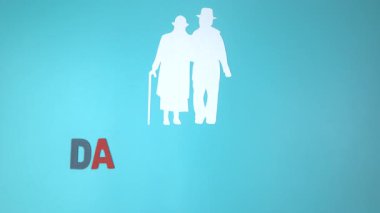 Video 4k aile kâğıdı mavi arka planda kesilmiş. Aile günü konsepti, koruyucu aile, aile içi şiddet, ev okulu, uluslararası aile günü, dünya ruhsal sağlık günü, dünya otizm farkındalık günü