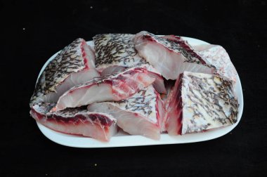 Raw Fish Meat on White Plate