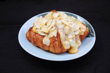 Almond Croissant on ceramic plate
