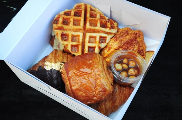 Croissants and Pastries in paper box