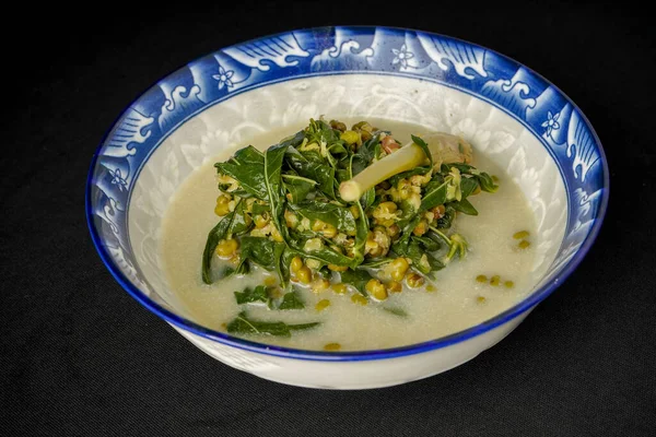 stock image green curry with chicken and vegetables