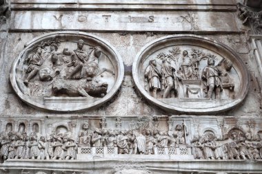 Fragment of Arch of Constantine in Rome, Italy clipart