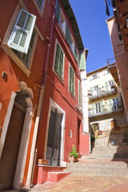 Narrow street in village Villefranche Sur Mer, France clipart