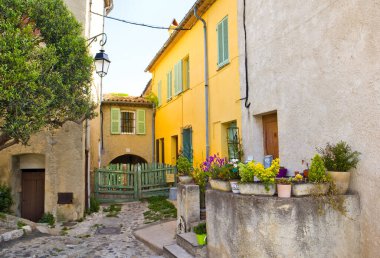 Patio of vintage stone house in downtown of Cagnes-sur-Mer, France clipart