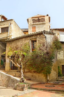 Vintage stone house in downtown of Cagnes-sur-Mer, France clipart