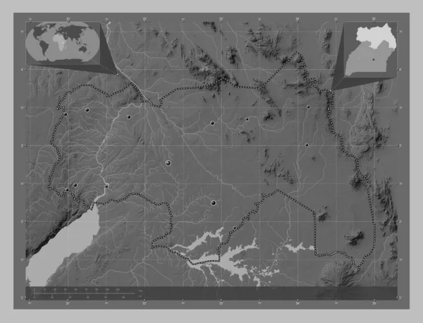 Northern, region of Uganda. Grayscale elevation map with lakes and rivers. Locations of major cities of the region. Corner auxiliary location maps