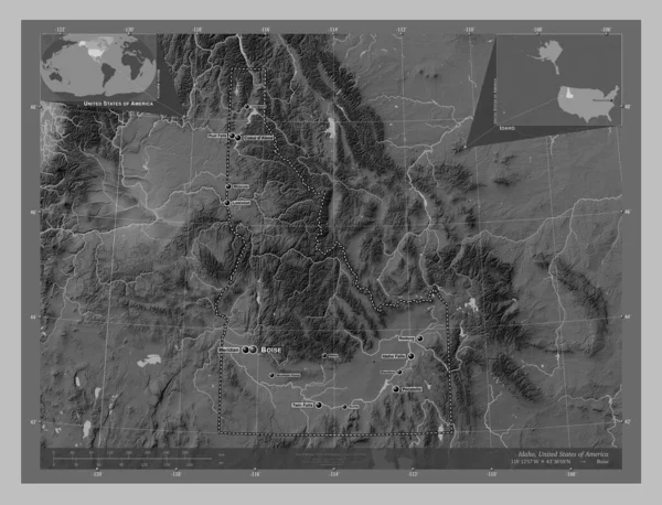 Idaho, state of United States of America. Grayscale elevation map with lakes and rivers. Locations and names of major cities of the region. Corner auxiliary location maps
