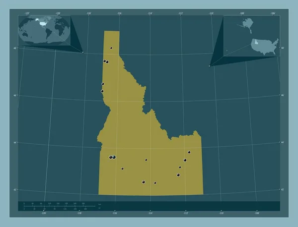 Idaho, state of United States of America. Solid color shape. Locations of major cities of the region. Corner auxiliary location maps
