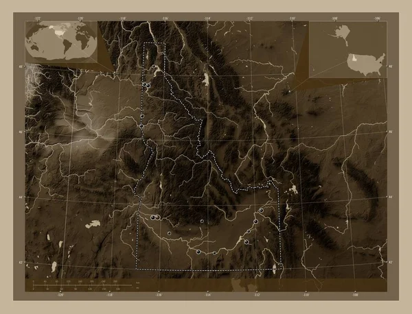Idaho, state of United States of America. Elevation map colored in sepia tones with lakes and rivers. Locations of major cities of the region. Corner auxiliary location maps