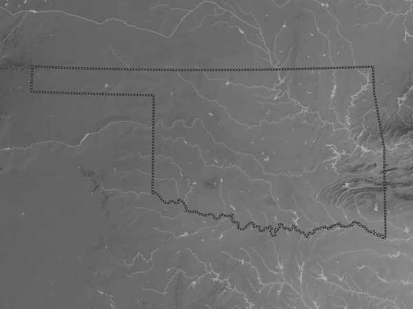Oklahoma, state of United States of America. Grayscale elevation map with lakes and rivers