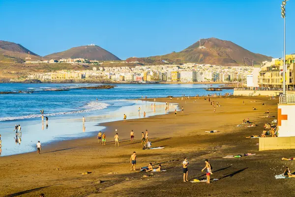 Las Palmas, Gran Canaria, Spain, December 21, 2022. Sunset at Las Canteras beach, Las Palmas, Spain. High quality photo