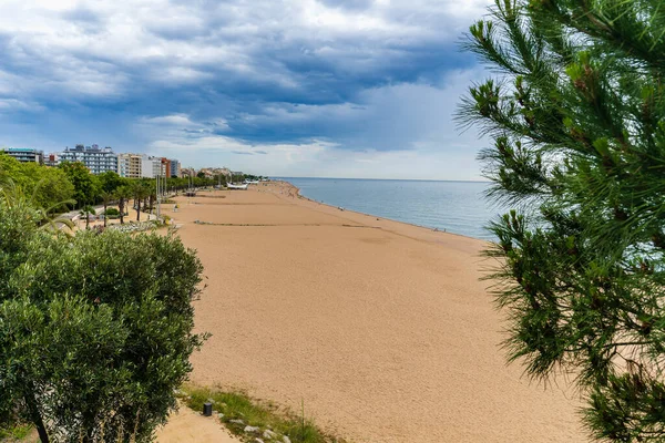 stock image Calella, Spain, June 14, 2023. Beach of the touristic city of Calella, in Barcelona, Spain. High quality photo