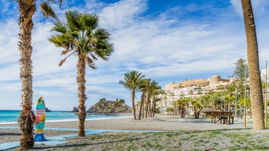 Almunecar, Spain, February 10, 2024. Beach of the city of Almunecar in the Andalusian province of Granada, in Spain. High quality photo clipart