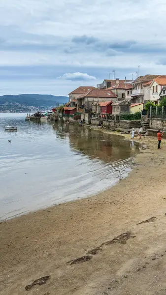 Combarro, İspanya, 5 Eylül 2024. Galiçya, Pontevedra 'daki Cobarro kasabasının manzarası. Yüksek kalite fotoğraf
