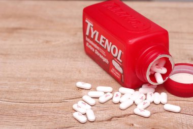 WASHINGTON, ABD - 15 Ekim 2022: 19 saat, baş ağrısı, ağrı kesiciler, ağrı kesiciler....