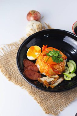 Barbecued red pork in sauce with rice served in the restaurant. There are many sold in Thailand.Barbecued red pork in sauce with rice is a popular food in Thailand.