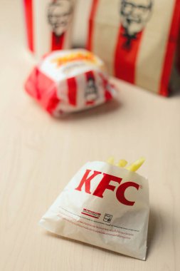 Bangkok, Thailand - January, 10 2023 : KFC Chicken Burger or Singer Burger served with soft drinks and french fries, KFC is a popular fast food in Thailand.