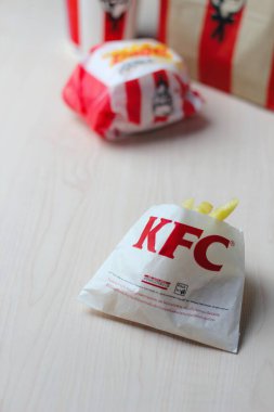 Bangkok, Thailand - January, 10 2023 : KFC Chicken Burger or Singer Burger served with soft drinks and french fries, KFC is a popular fast food in Thailand.