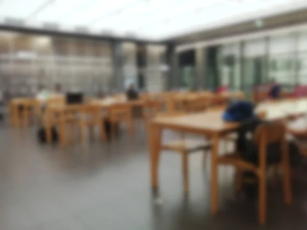 Blurred image of coffee shop blur background with bokeh.