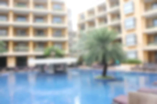 Abstract blur hotel and swimming pool in hotel resort background for design.