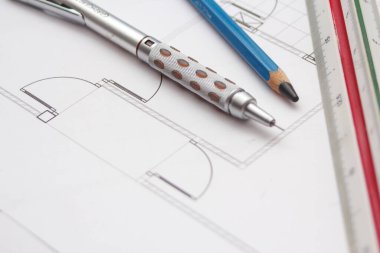 Pencils and ruler on a construction plan, close-up, architect, architecture,drawing architect.