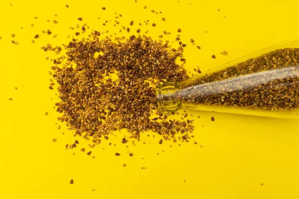 stock image Useful buckwheat tea in a glass bottle