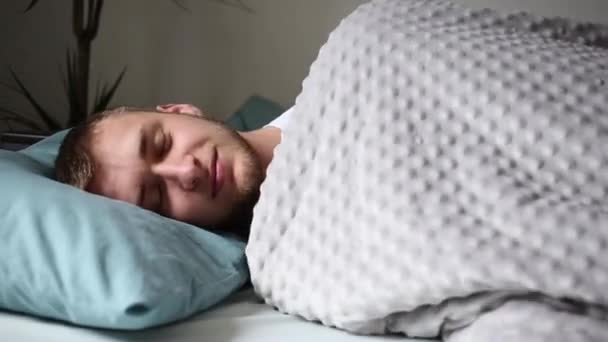 Man Covers Himself Blanket — Stock Video