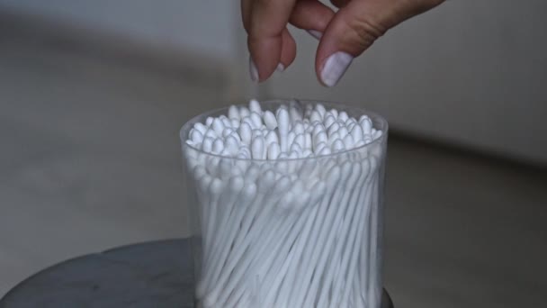 Girl Pulls Out Cotton Swab — Stock Video