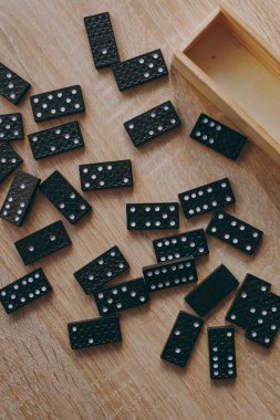 Dominoes in a wooden box, a game for two