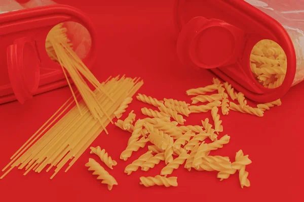Red Jar Macaroni Red Background Monochrome — Stock Photo, Image