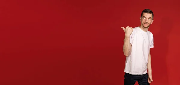 Banner Young Man White Shirt Pointing Finger Direction Copyspace — Stock Photo, Image