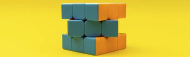 Sarı arkaplanda Rubik küpü, afiş