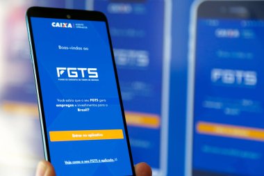 Bir cep telefonu ekranında mavi arkaplan ile Caixa fgts uygulaması.