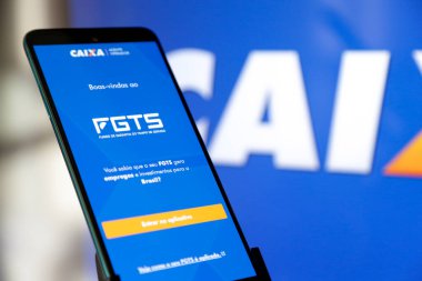 Bir cep telefonu ekranında mavi arkaplan ile Caixa fgts uygulaması.
