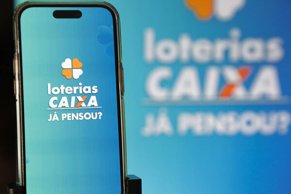 Lottery Draw in the Palm of Your Hand app with vibrant blue background.