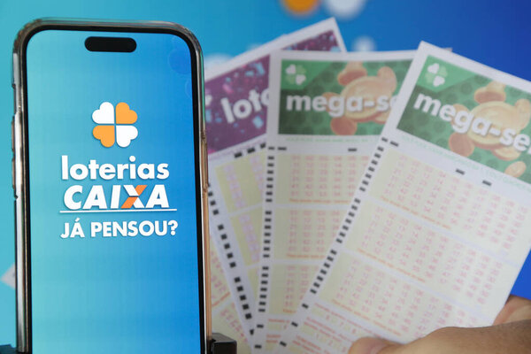 Lottery Draw in the Palm of Your Hand app with vibrant blue background.